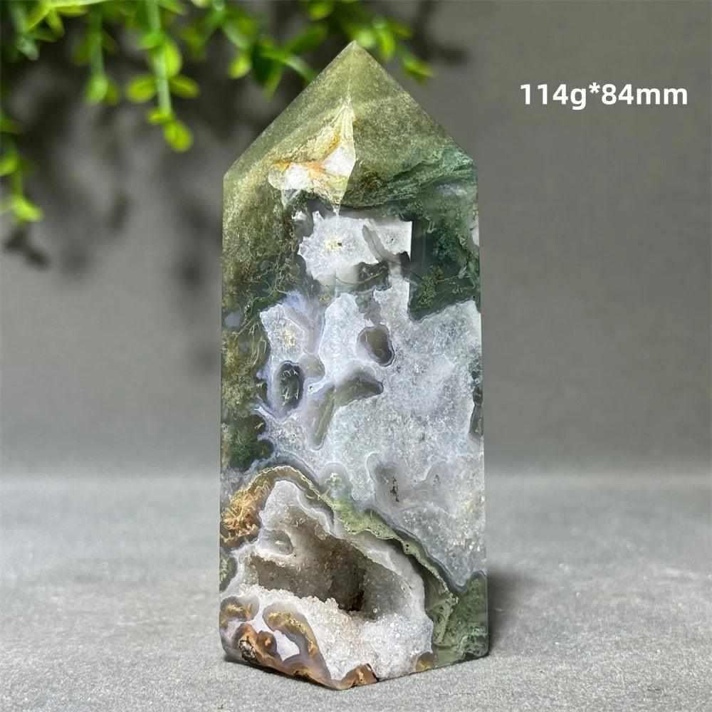 Polished Aquatic Agate Crystal Cave Tower featuring green water-like patterns and a sparkling quartz inner sanctuary.
