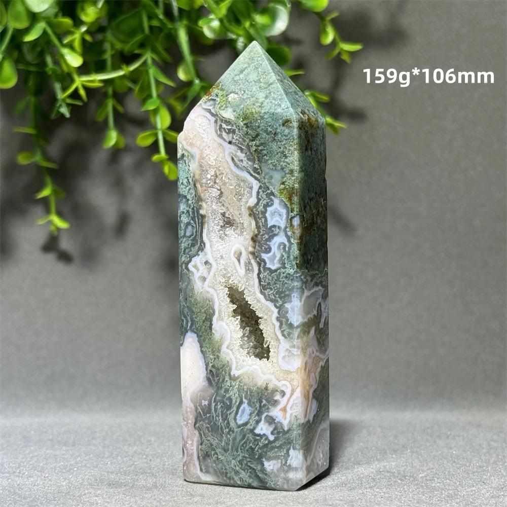 Aquatic Agate Crystal Cave Tower with green water-like patterns and a sparkling quartz-lined pocket for chakra healing.