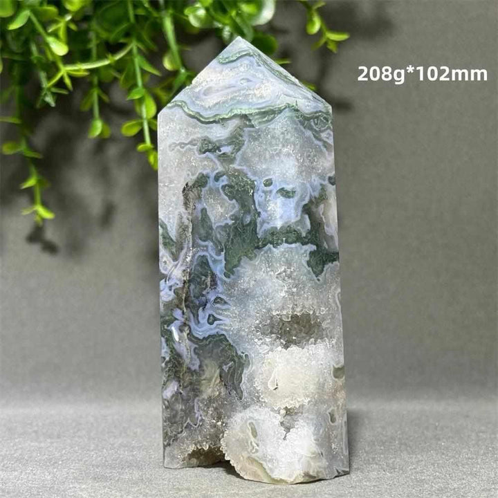 Aquatic Agate Crystal Cave Tower with flowing blue-green patterns and a sparkling quartz sanctuary for chakra healing.