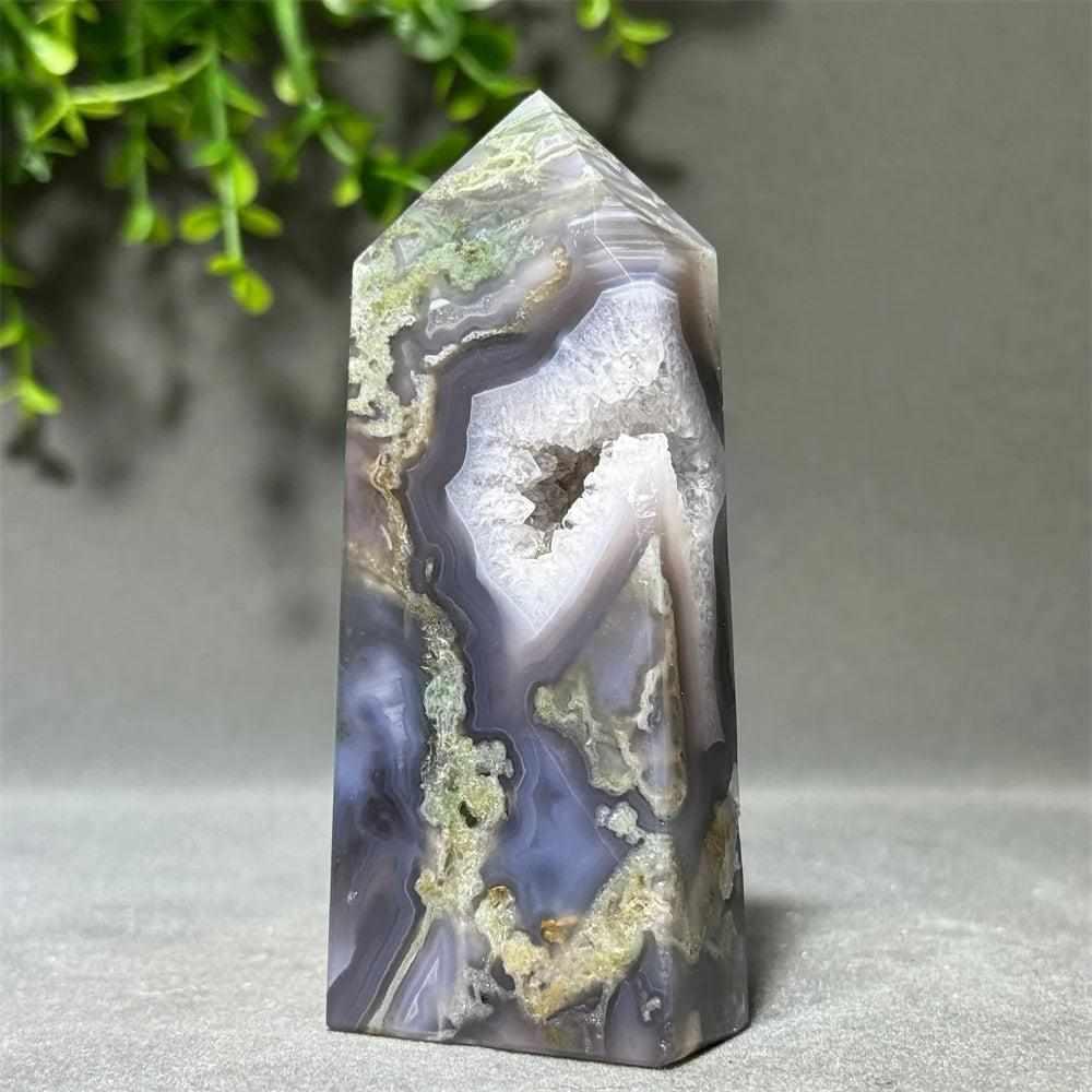 Polished Aquatic Agate crystal tower with a sparkling quartz cave, featuring calming water patterns for chakra healing.