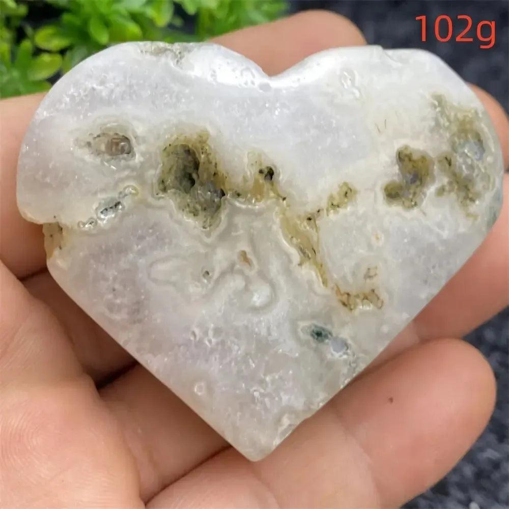 Aquatic Agate Geode Heart: soothing blue & white crystal with sparkling druzy cavity, promoting emotional balance.