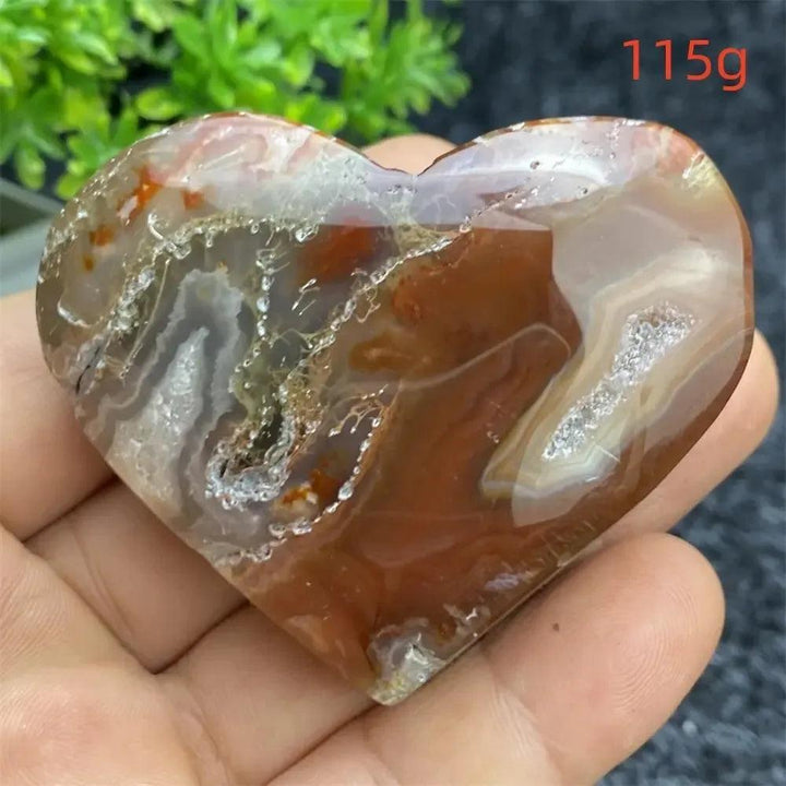 Aquatic Agate Geode Heart: soothing, nurturing crystal with natural druzy cavity, red, white, and brown tones.