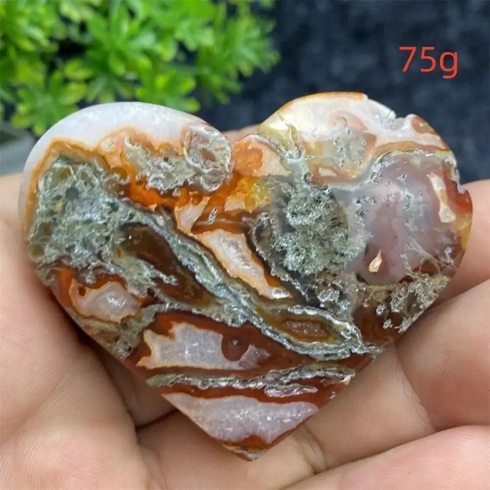 Heart-shaped geode with earthy tones, natural druzy cavity, and polished finish.