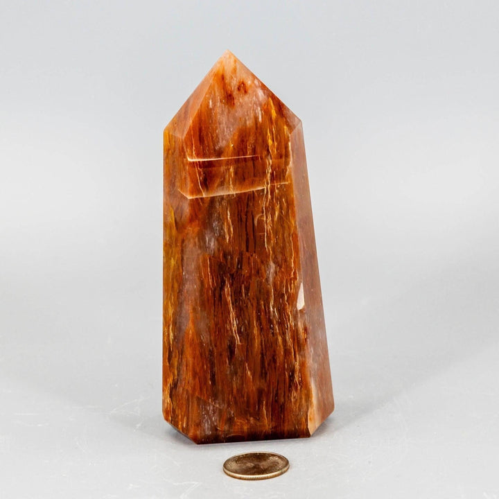 Rare Aragonite XL Tower: thick, polished crystal in warm cream to brown tones, showcasing natural patterning.