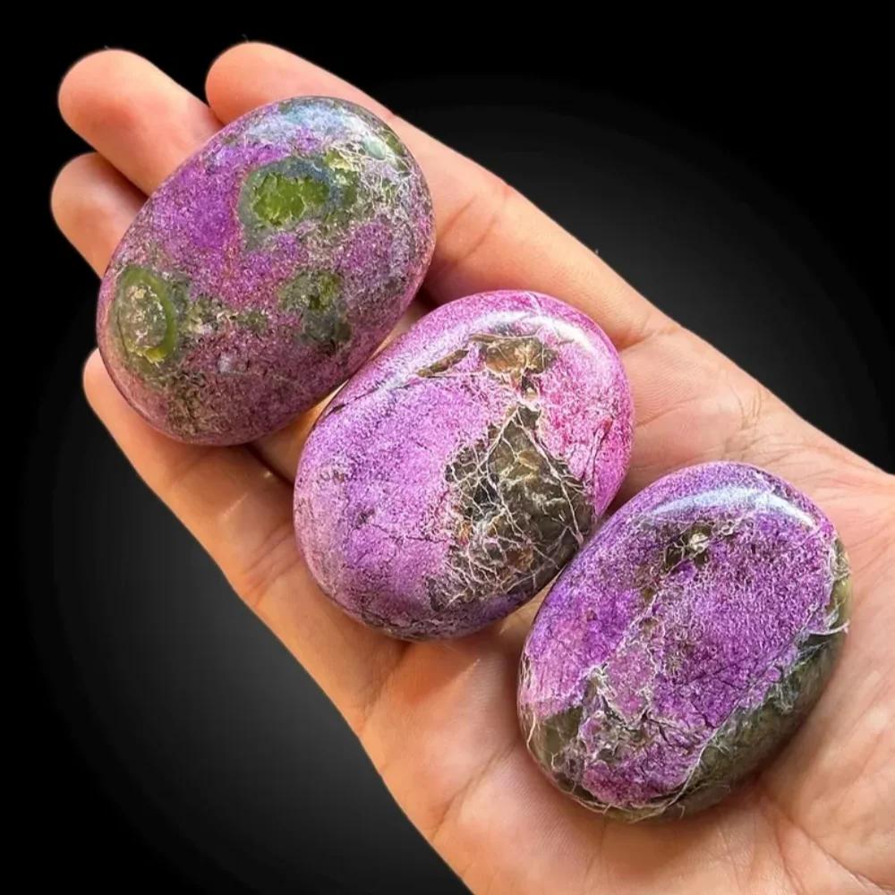 Bohemian Atlantis Crystal Palm Stones with vibrant marbled purple and green healing energy.