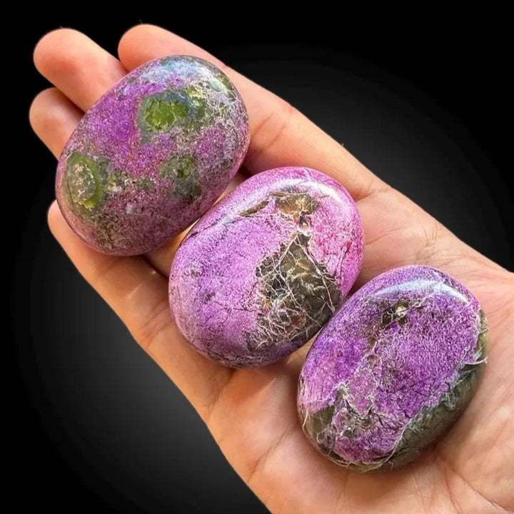 Bohemian Atlantis Crystal Palm Stones with vibrant marbled purple and green healing energy.