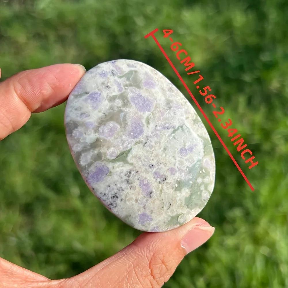 Atlantisite Crystal Polished Palm Stone with green serpentine and purple stichtite for healing.