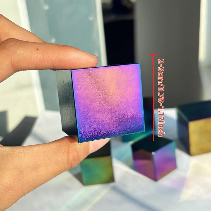 Polished Aura Black Obsidian Cube with vibrant, iridescent purple and blue metallic sheen.
