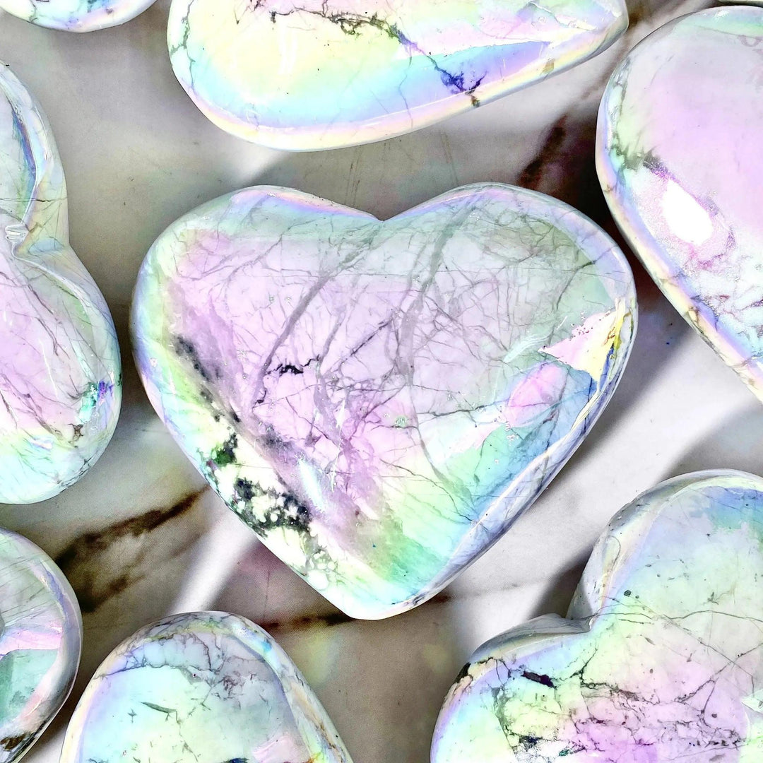 Iridescent Aura Howlite crystal heart from Crystal Destiny, displaying calming rainbow hues and natural veining.