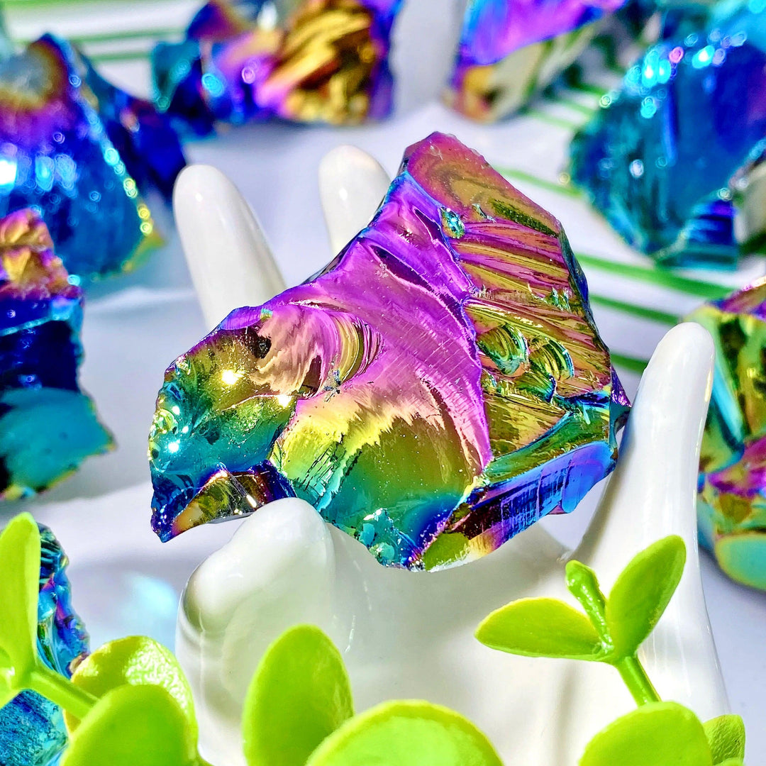 Aura Obsidian Raw Crystal Stone for Grounding Protection, displaying iridescent gold, violet, and teal hues.
