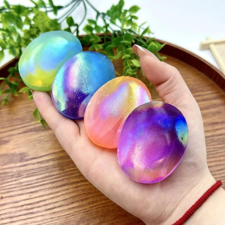 Iridescent Aura Selenite Crystal Palm Stones with rainbow shimmer for crown chakra healing.