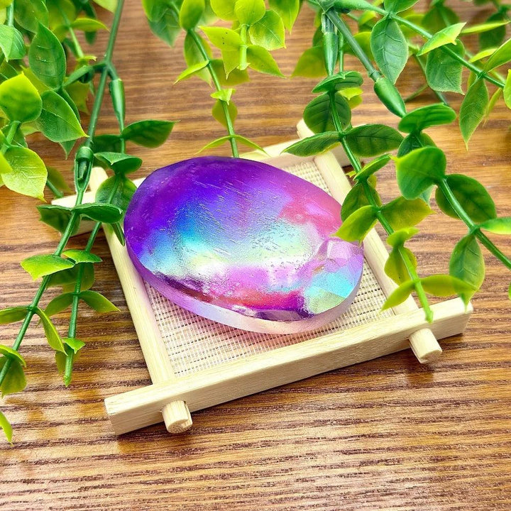 Iridescent Aura Selenite Crystal Palm Stone with a vibrant rainbow shimmer for crown chakra healing.