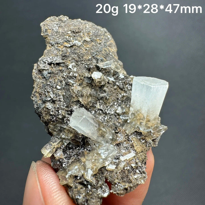 Natural clear aurora columnar calcite cluster raw healing stone specimen.