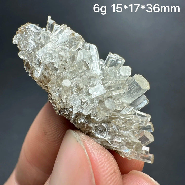 Clear Aurora columnar calcite cluster flower healing stone, a natural raw crystal specimen.