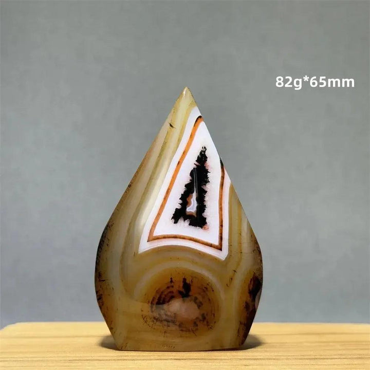 Banded Agate freeform torch from Crystal Destiny, 82g, 65mm, with earthy brown, white, and orange layers.