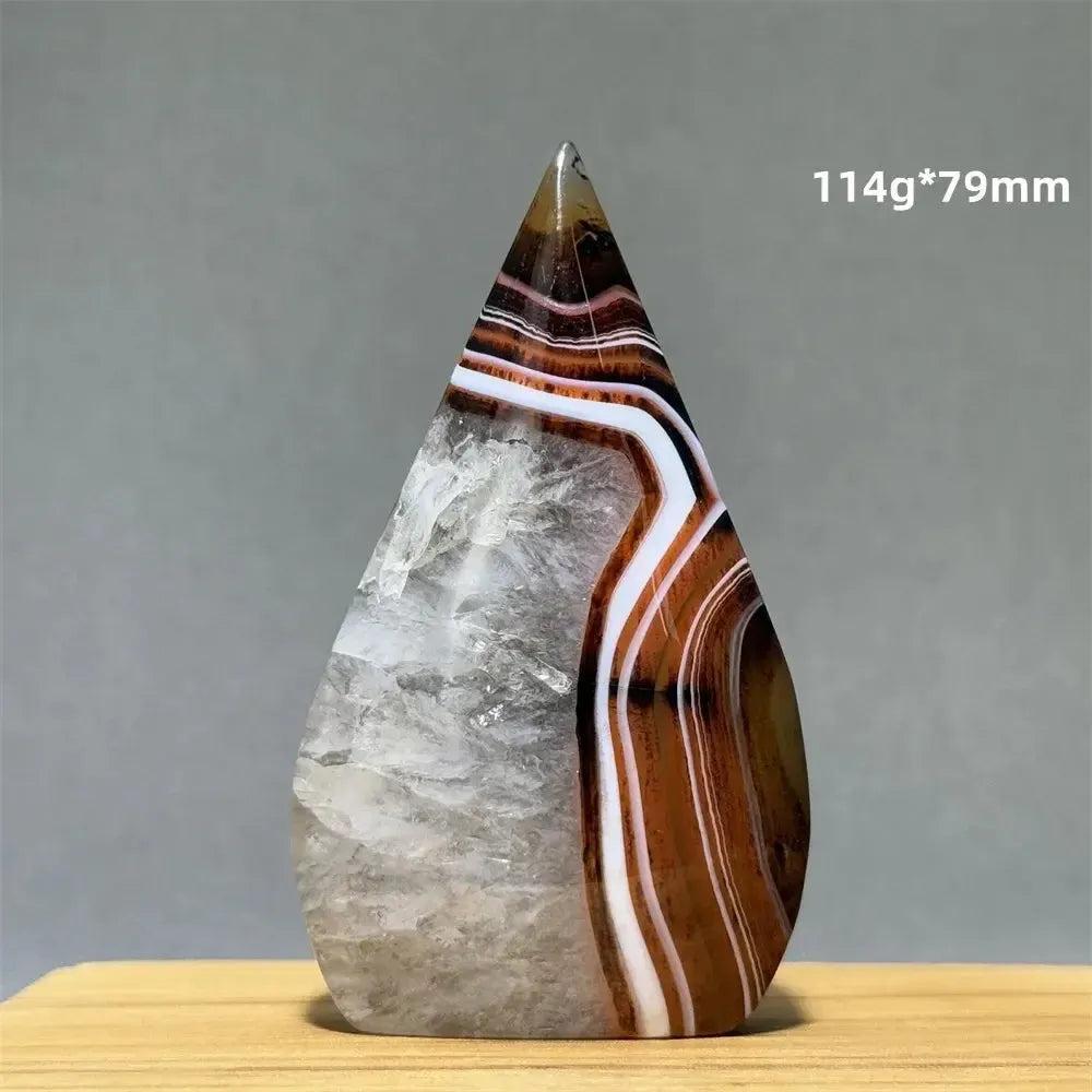 Banded Agate freeform torch from Crystal Destiny, 114g*79mm, with clear quartz and brown, white, and black stripes.