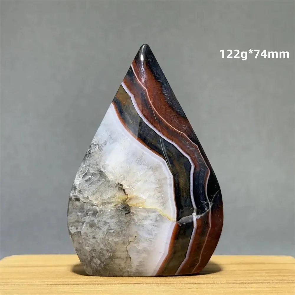 Natural Banded Agate freeform torch from Crystal Destiny, featuring earthy browns, white, and black stripes.