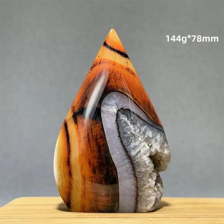 Crystal Destiny's banded agate freeform torch, 144g*78mm, with warm orange, brown, and grey layers.