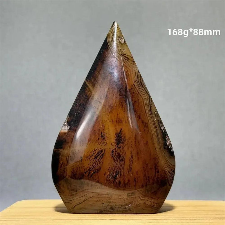 Banded Agate freeform torch from Crystal Destiny, featuring warm brown and tan layers, 168g, 88mm.