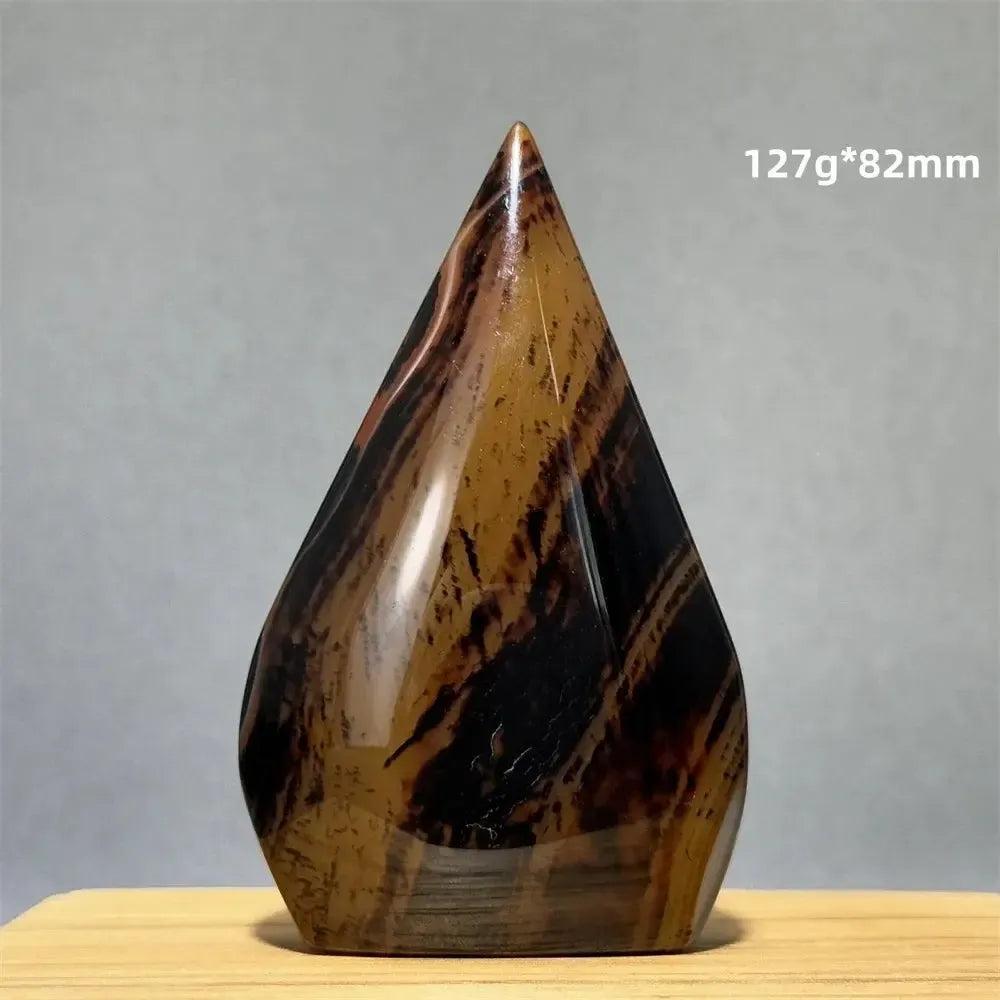 Crystal Destiny's banded agate freeform torch, 127g*82mm, with warm brown, black, and tan stripes.