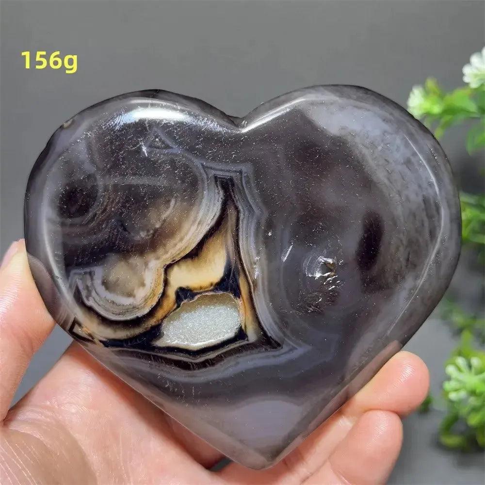 Banded Agate Geode Crystal Heart for Grounding & Stability, with bold concentric banding and glittering druzy.