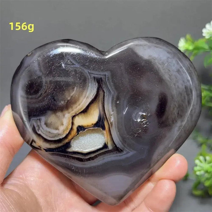 Banded Agate Geode Crystal Heart for Grounding & Stability, with bold concentric banding and glittering druzy.