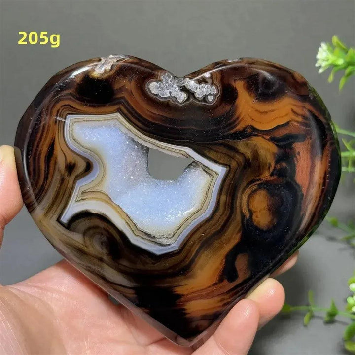 Banded Agate Geode Crystal Heart for Grounding & Stability, with bold red, black, brown, white layers and sparkling druzy.