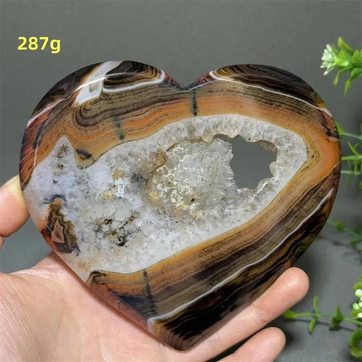 Banded Agate Geode Crystal Heart for Grounding & Stability, with red, black, brown, white concentric layers and sparkling druzy.