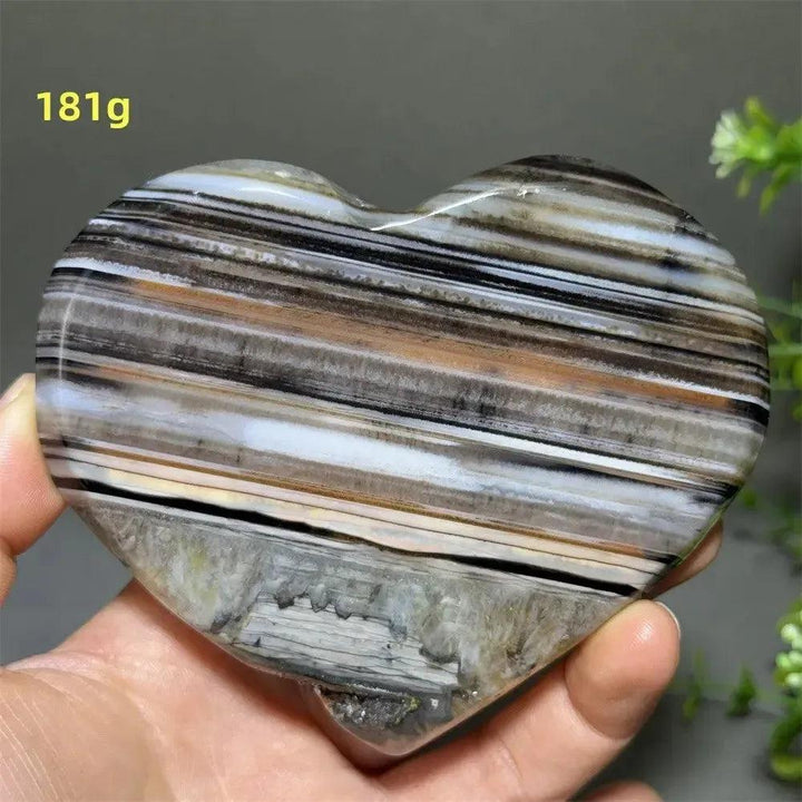 Banded Agate Geode Crystal Heart for Grounding & Stability, 181g, with bold red, black, brown, and white stripes.