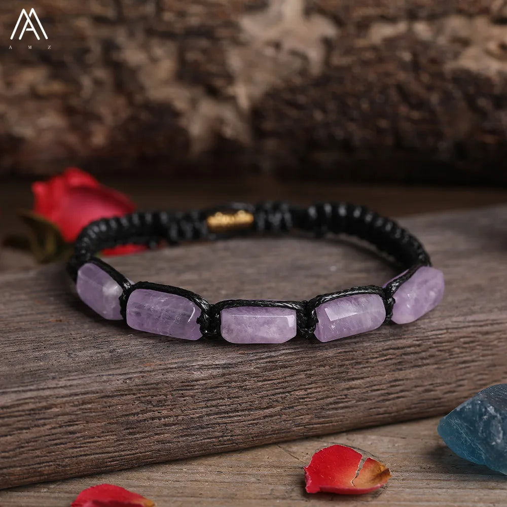 Amethyst barrel beaded adjustable bracelet with smooth purple gemstone beads on a black cord for calming energy.