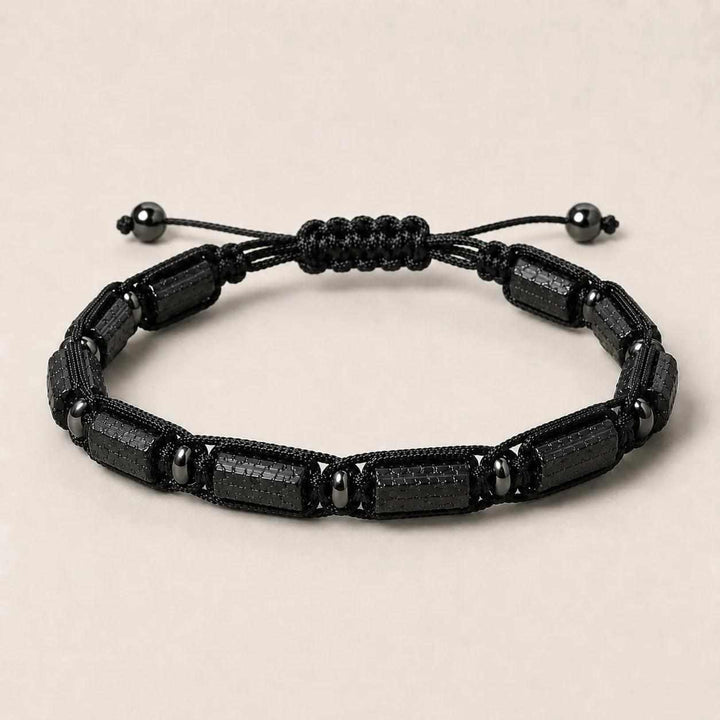 Black Tourmaline Barrel Beaded Adjustable Bracelet for protection, featuring sleek, textured natural stone cylinders.