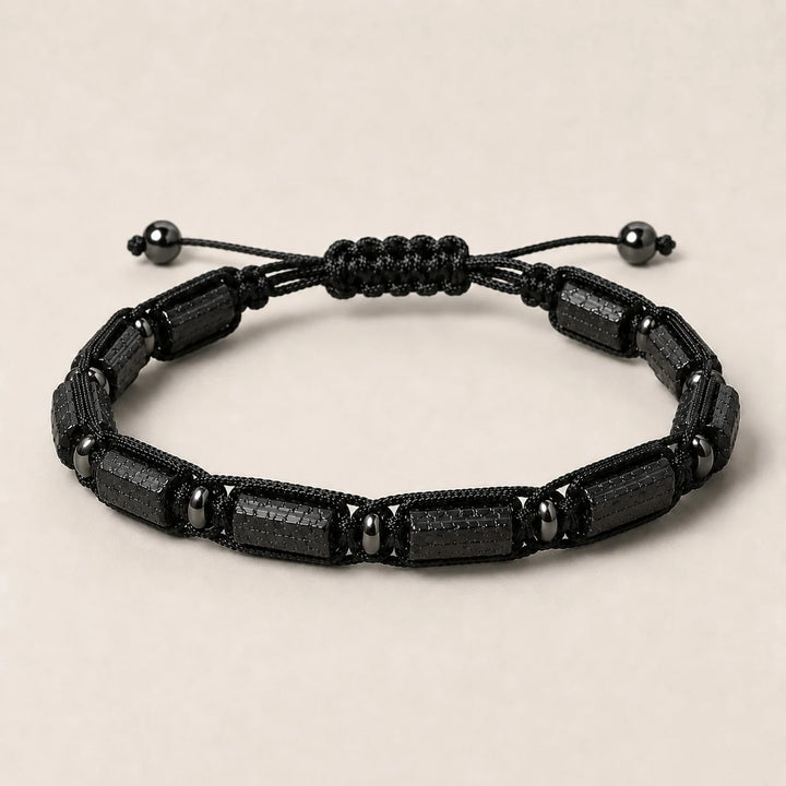 Black Tourmaline Barrel Beaded Adjustable Bracelet for protection, featuring sleek, textured natural stone cylinders.