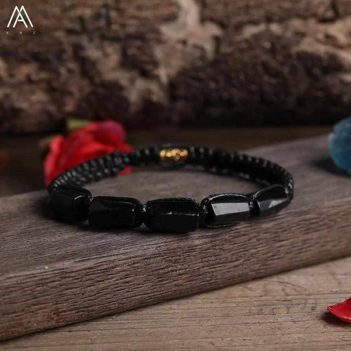 Black Tourmaline Barrel Beaded Adjustable Bracelet for protection with smooth, grounding natural stone beads on a cord.