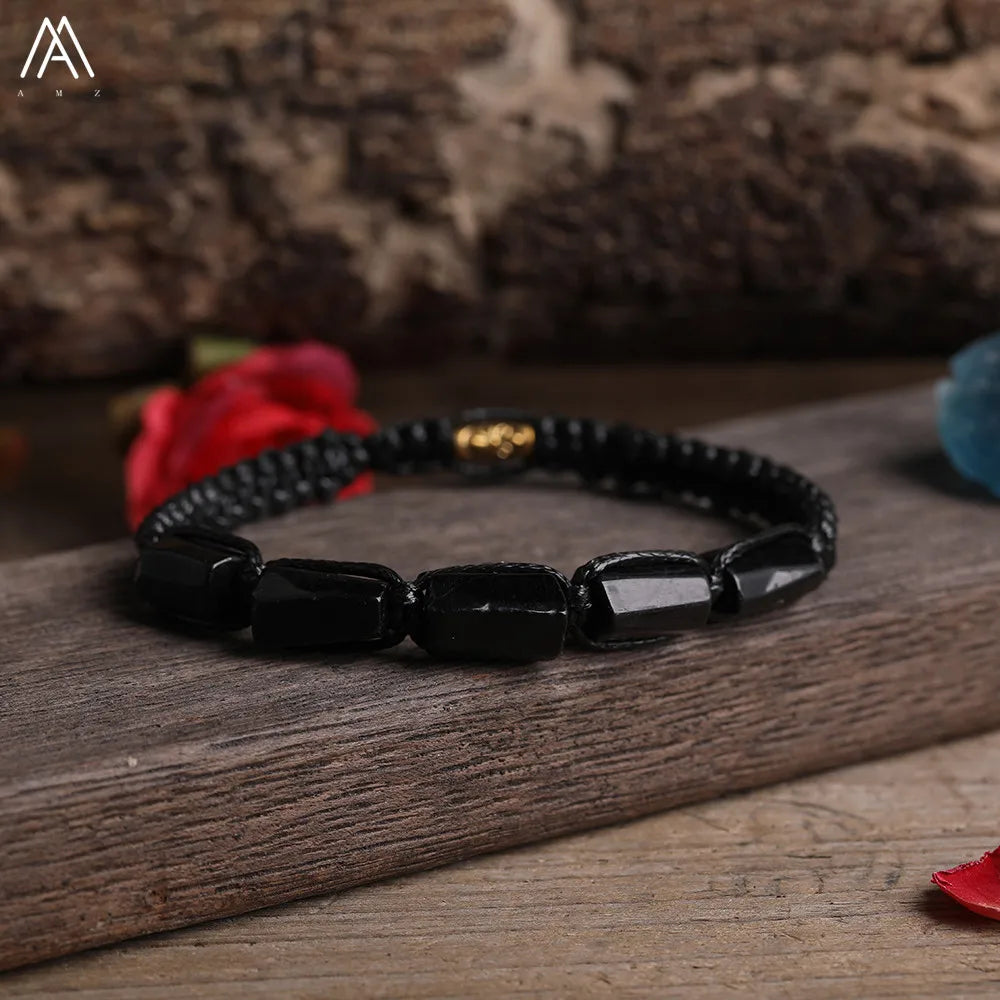 Black Tourmaline Barrel Beaded Adjustable Bracelet for protection with smooth, grounding natural stone beads on a cord.