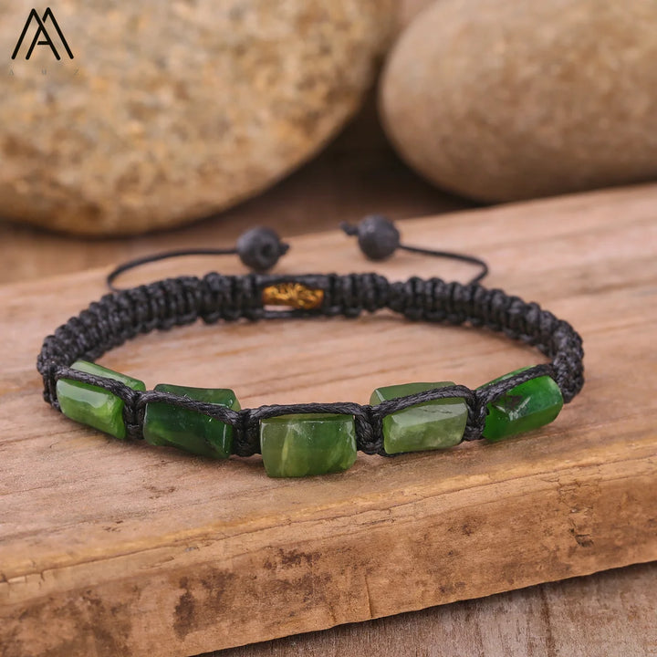 Green Jade barrel beaded adjustable bracelet with black lace-up cord for grounding energy and a comfortable fit.