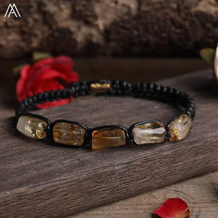 Citrine Barrel Beaded Adjustable Bracelet featuring golden natural stone beads on a durable black lace-up cord.