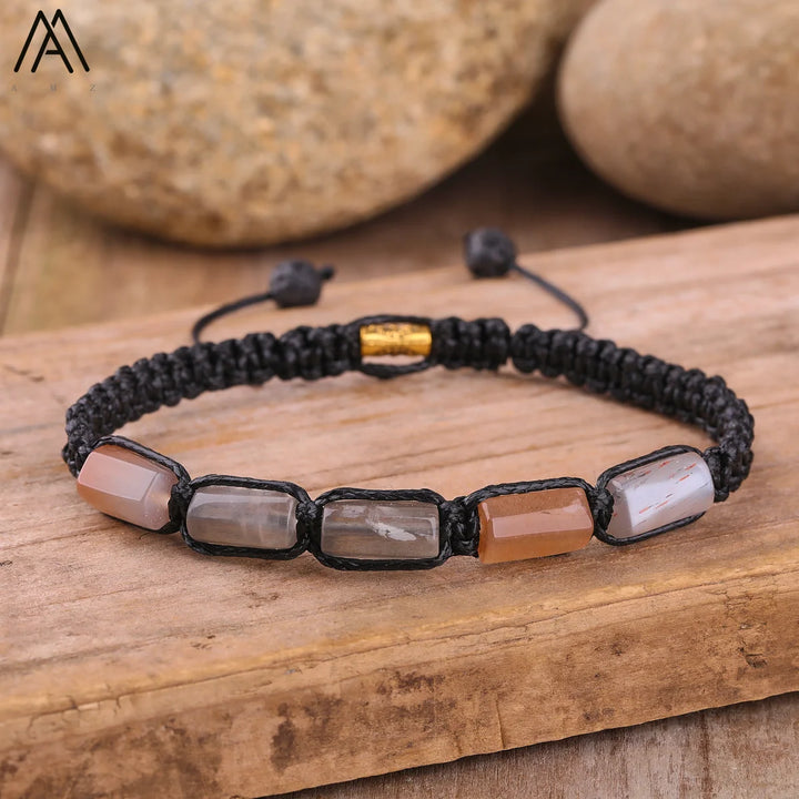 Adjustable Moonstone Barrel Beaded Bracelet with smooth, grounding natural stone beads on a durable black lace-up cord.