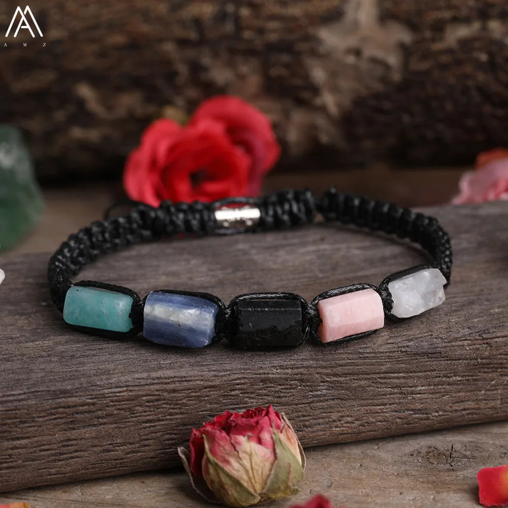 Adjustable barrel beaded bracelet featuring multi-colored natural gemstone beads on a durable black lace-up cord.