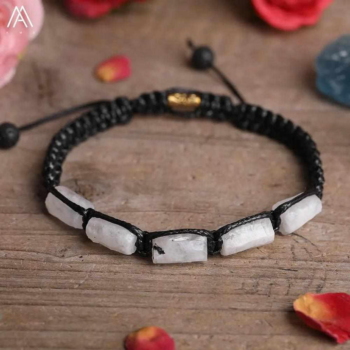 Moonstone Barrel Beaded Adjustable Bracelet with smooth white crystal stones on a durable black braided cord.