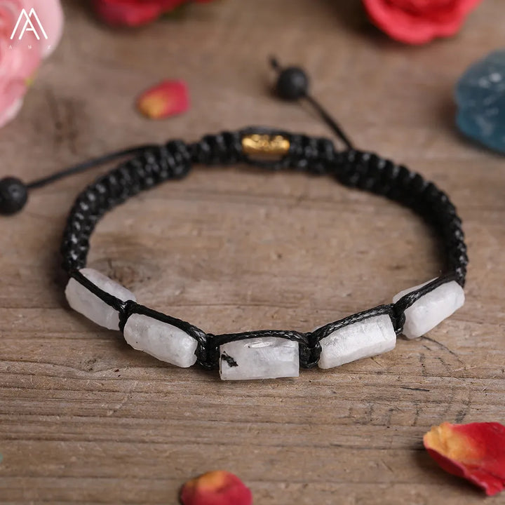 Moonstone Barrel Beaded Adjustable Bracelet with smooth white crystal stones on a durable black braided cord.