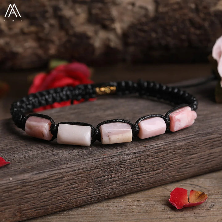Pink Opal barrel beaded adjustable bracelet with smooth, grounding natural stone beads on a black lace-up cord.