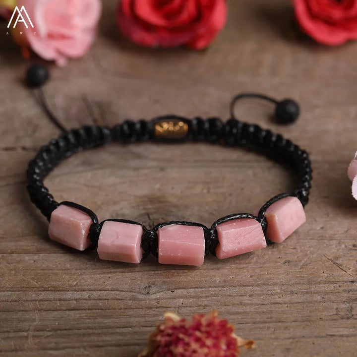 Rose Quartz Barrel Beaded Adjustable Bracelet with smooth pink gemstone beads on a durable black lace-up cord.