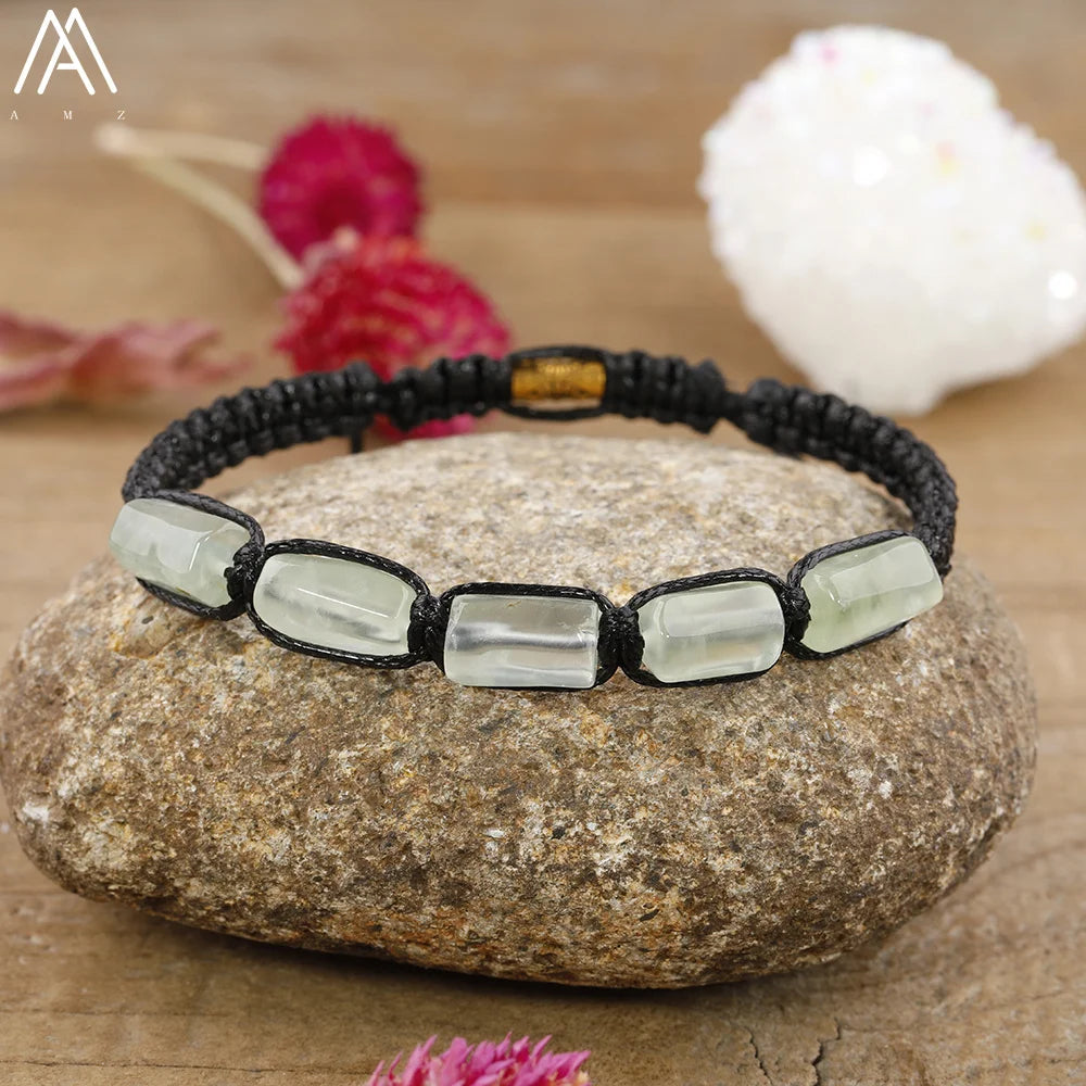 Green Prehnite barrel beaded adjustable bracelet with a black lace-up closure for grounding and healing energy.