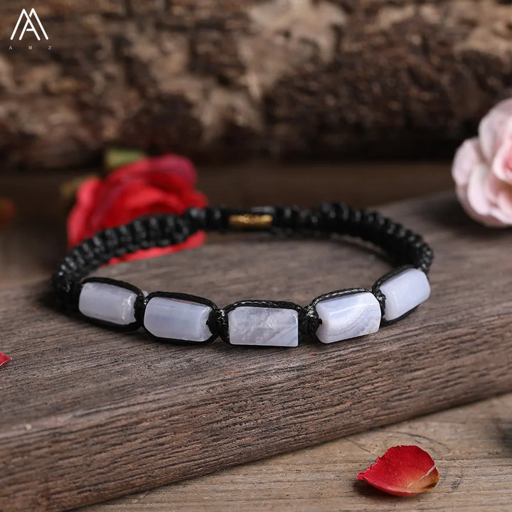 Blue Lace Agate Barrel Beaded Adjustable Bracelet with smooth, calming stone beads on a durable black lace-up cord.