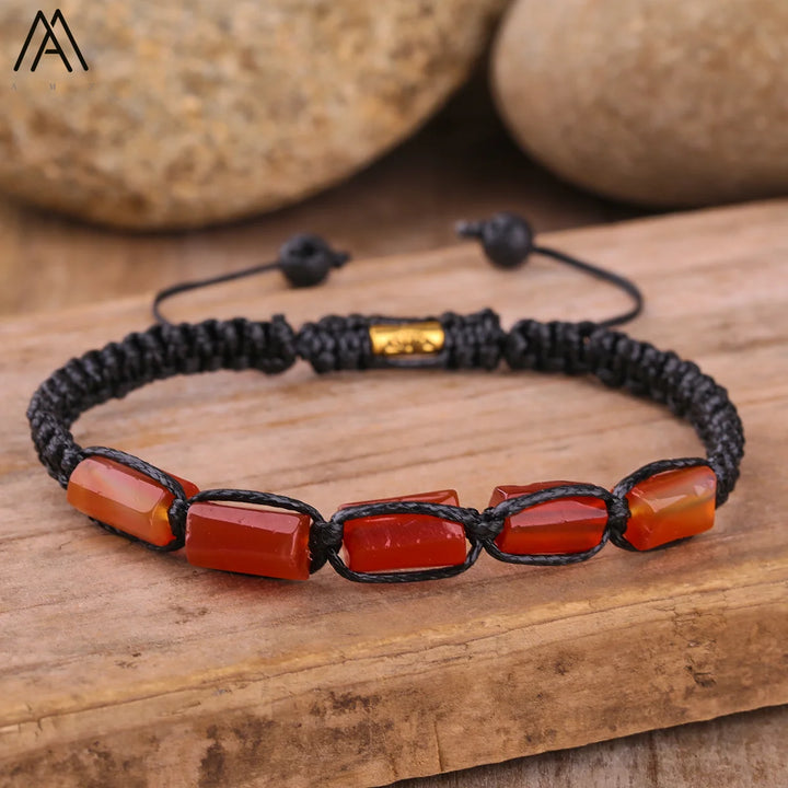 Adjustable Carnelian Barrel Beaded Bracelet with vibrant orange natural stone cylinders on a durable black cord.