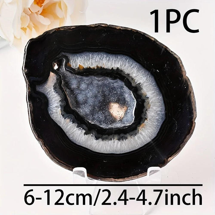 Polished Black Agate Crystal Geode Slice with sparkling inclusions for grounding and protection.