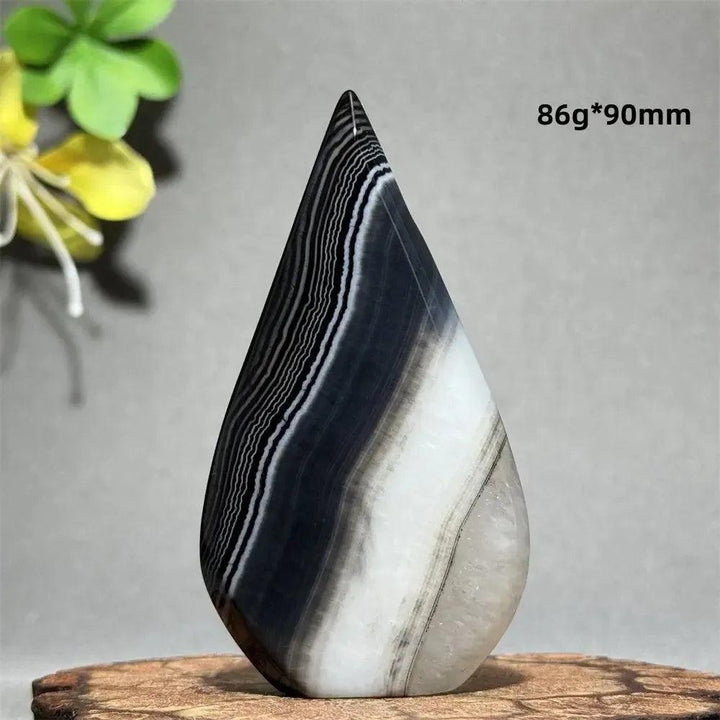 Polished Black Agate Freeform Torch, 86g, 90mm, with striking white and gray banding, for grounding and protection.