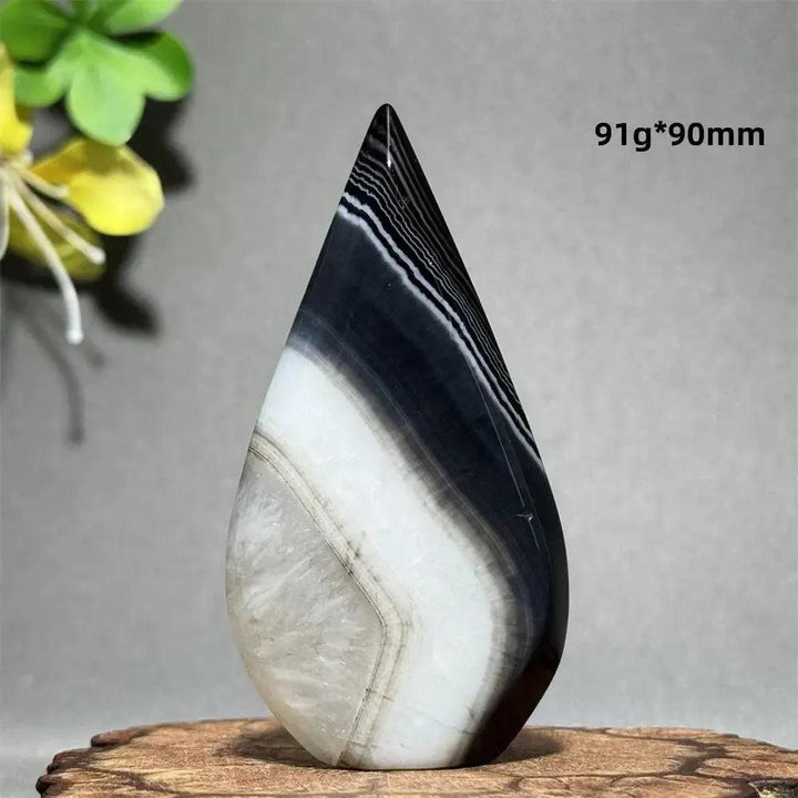Black Agate Freeform Torch: Polished black, white, and gray banded agate flame, 91g, 90mm. Grounding and protective.