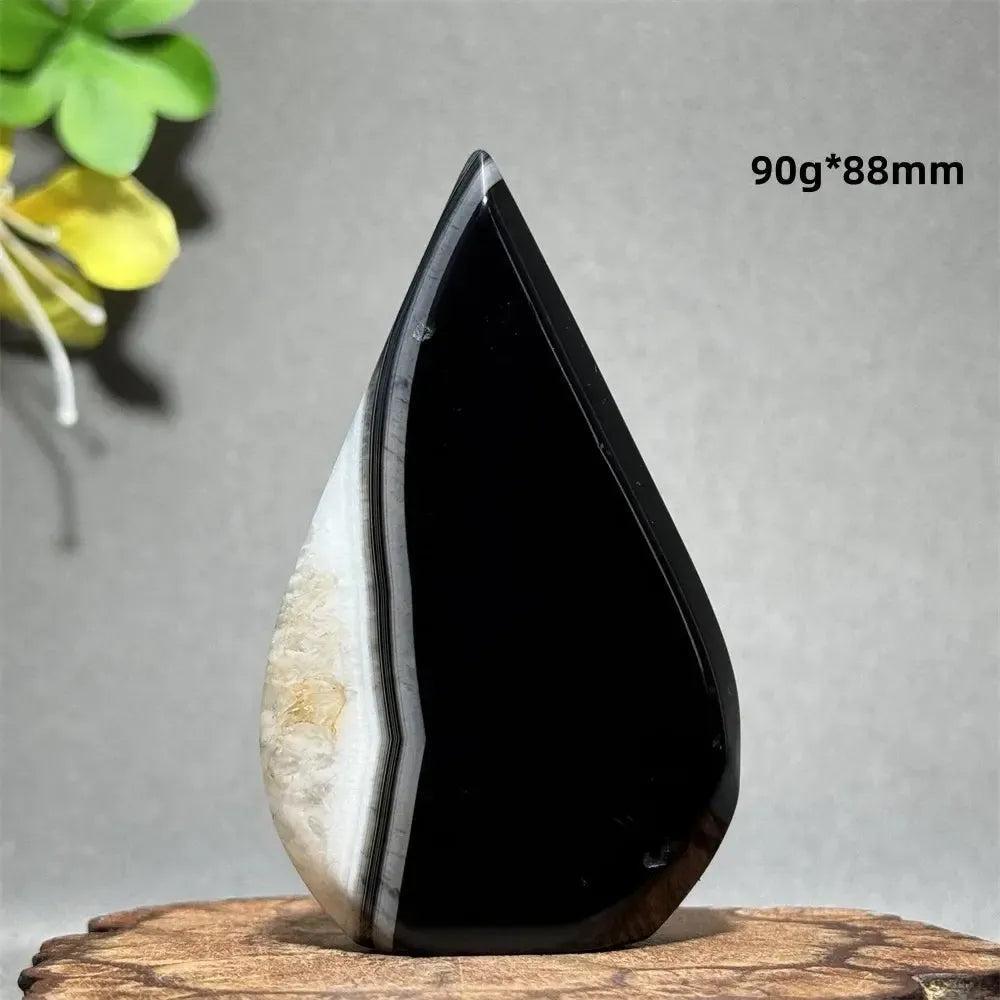 Polished Black Agate Freeform Torch, 90g*88mm, with deep black, white, and gray banding, promoting grounding and protection.