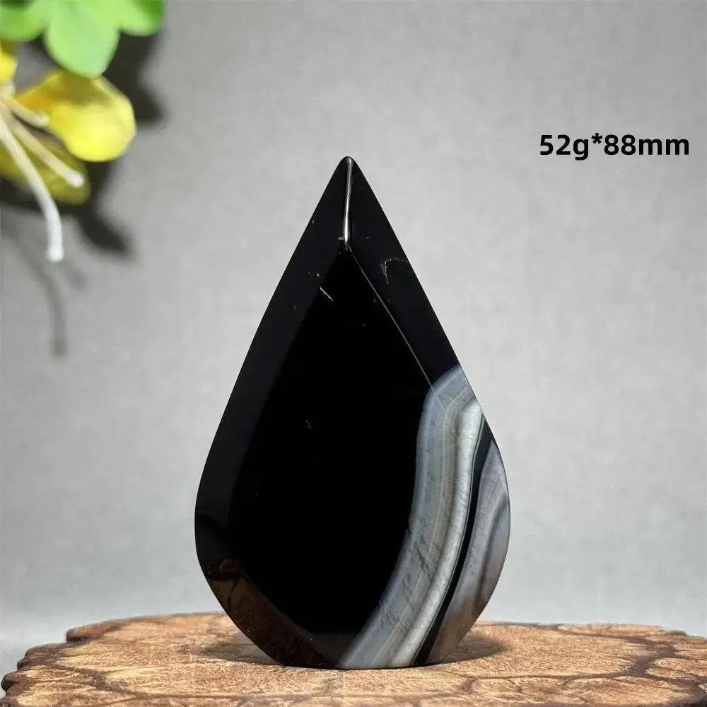 Black Agate Freeform Torch: Polished deep black agate with white/gray bands, 52g, 88mm, flame silhouette for grounding.